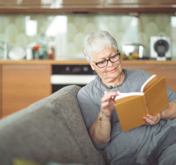 senior lady reading book