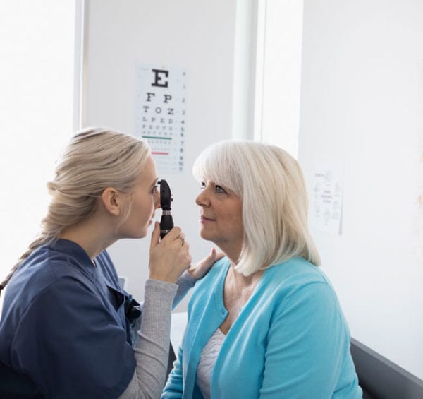 optometrist with patient