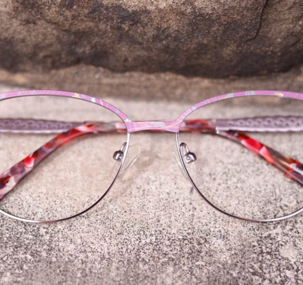 round metal pair of pink glasses